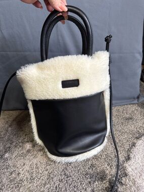 UGG Black and Cream Faux Shearling Shoulder Bucket Bag